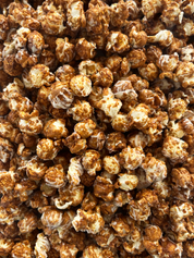 Chocolate PeanutButter. New recipe. Ella's Popcorn Tray Image chocolate, peanut butter with butterfinger mix ins.
