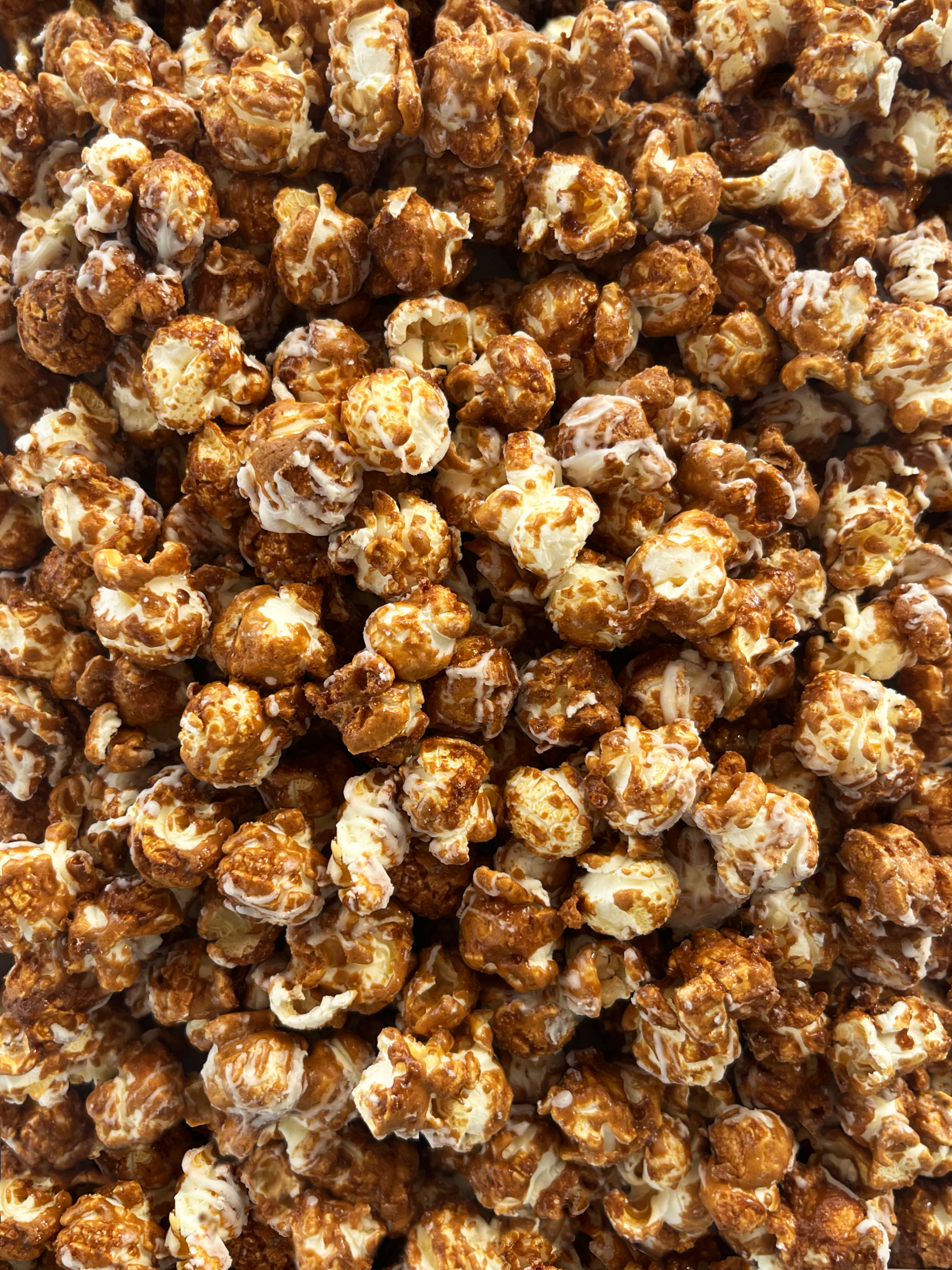 Chocolate PeanutButter. New recipe. Ella's Popcorn Tray Image chocolate, peanut butter with butterfinger mix ins.