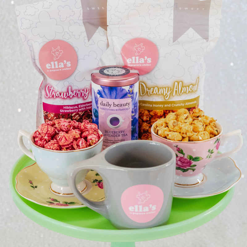 Ella's Mother Day Trio! Curated with 2 of mom's favorite Ella's Popcorn Flavors: Strawberry Hibiscus and Bee Dreamy Honey Almond. Box is included with 1 republic of tea, and 1 Ella's Popcorn mug.